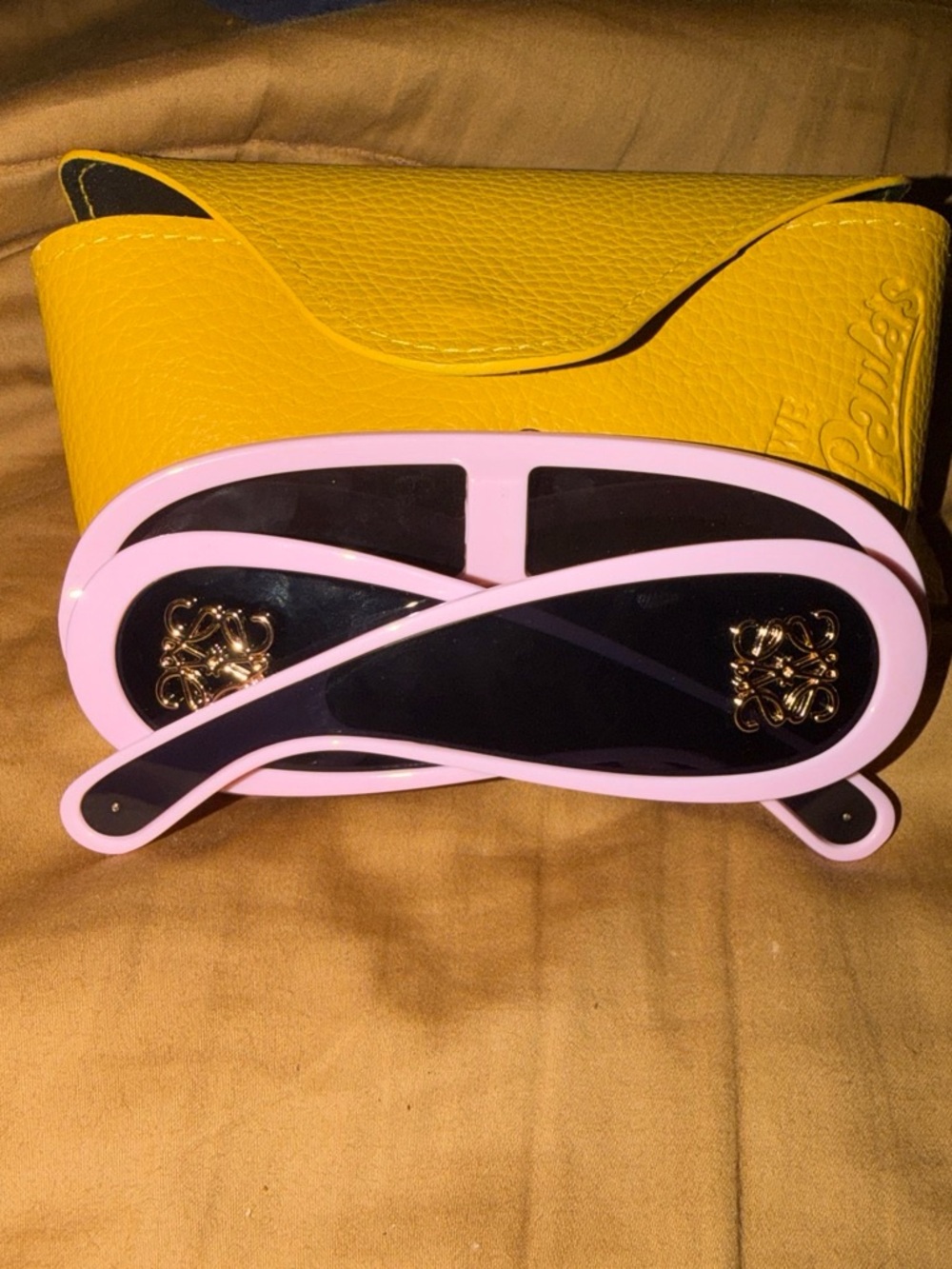 Women’s Pink Frame Sunglasses with Black Lenses and Yellow Case